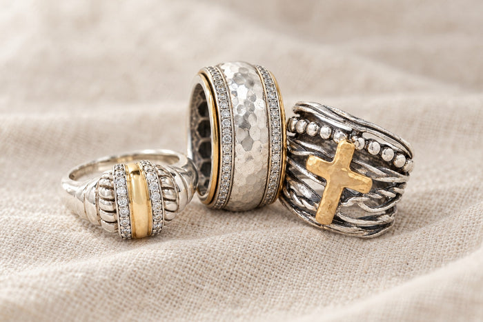 An everyday ring stack: Idalia, Bella and Abby Cross rings on linen