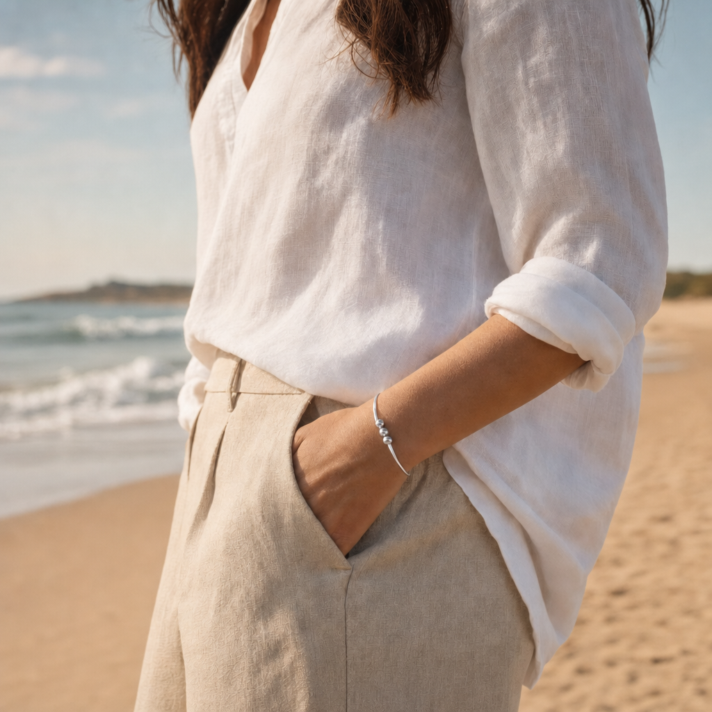 Coastal Triple Ball Bracelet in All Sterling Silver, worn by a model, Ideaure photo