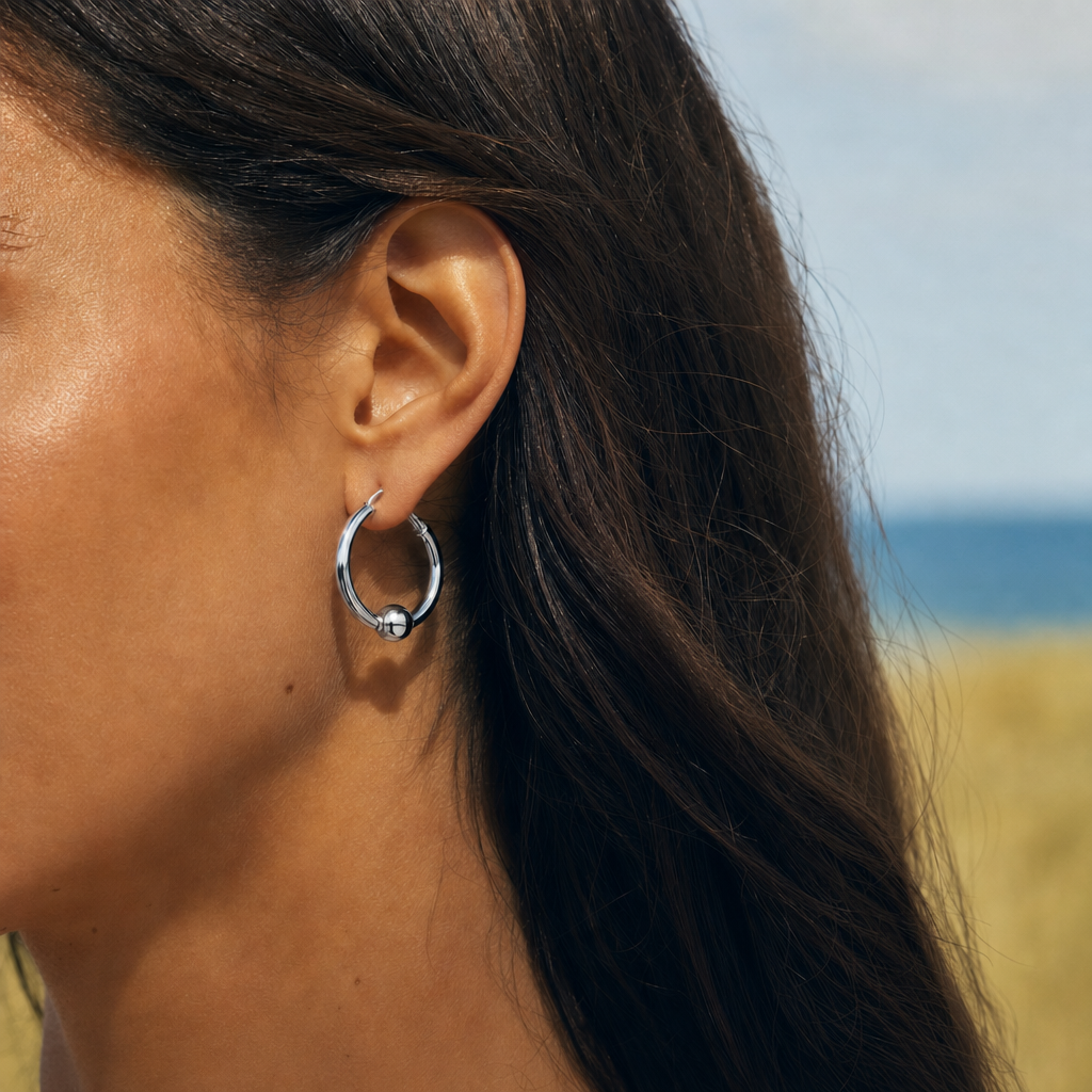 Coastal Ball Hoop Earrings in All Sterling Silver, worn by a model, Ideaure photo