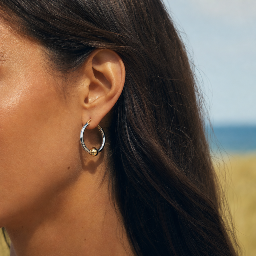 Coastal Ball Hoop Earrings in Sterling Silver with 14k Gold Filled Ball, worn by a model, Ideaure photo