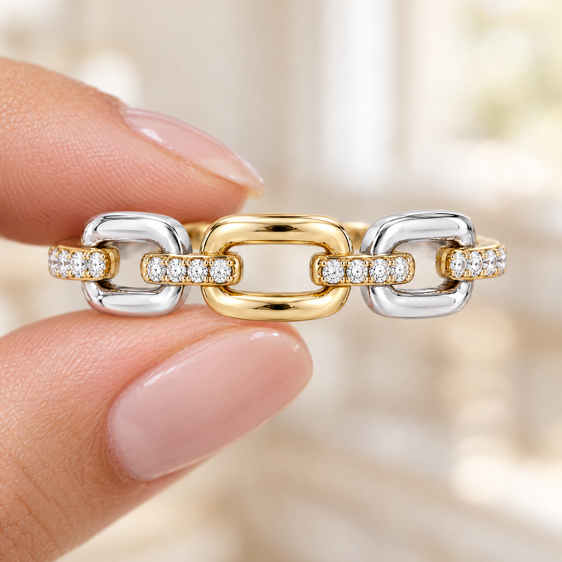 Paperclip Link Ring held in fingertips
